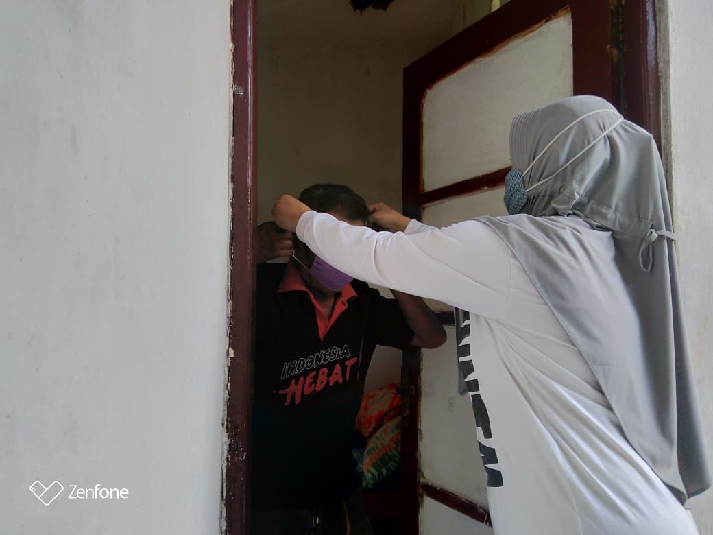 Sisir Protokol Kesehatan dengan membagikan masker secara gratis